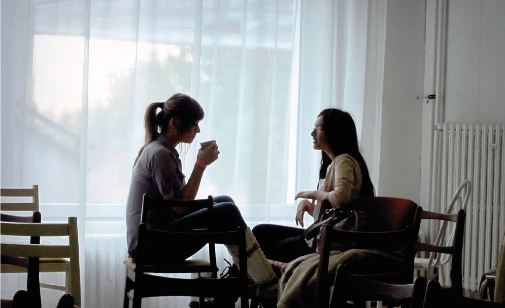 two women talking