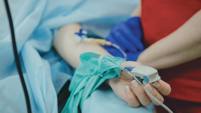 Close up of intensive care patient's hand
